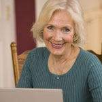 Senior researching when to enroll in Medicare